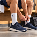 Tennissocken mit Logo vor dem Training – Designbeispiel